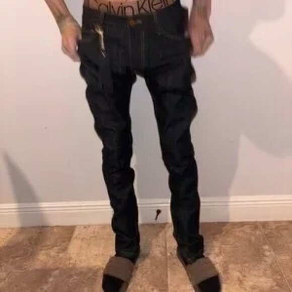 Stylish men's new, unworn (NWT) raw denim jeans from Fear of God, featuring a 30 - Picture 8 of 13